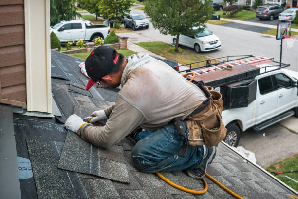 Professional Storm Damage Roof Repair technician working in Vass, NC